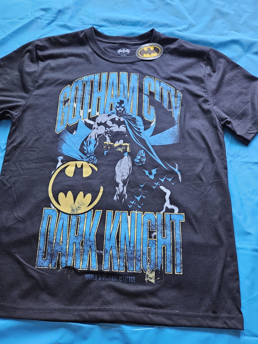 Batman Black Short Sleeve Tee with Blue and Yellow Gotham Graphic